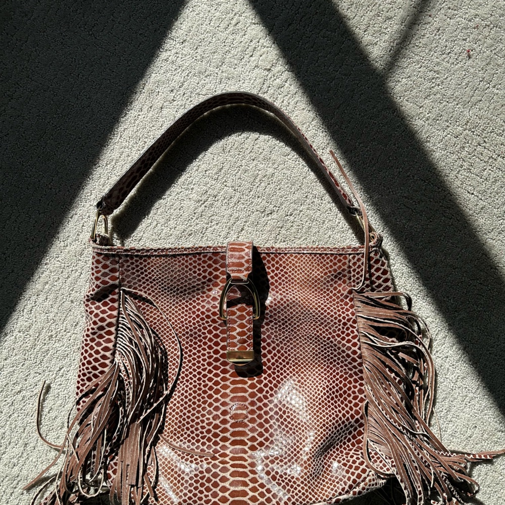 G.I.L.I. Handbag with fringe and snake embossed